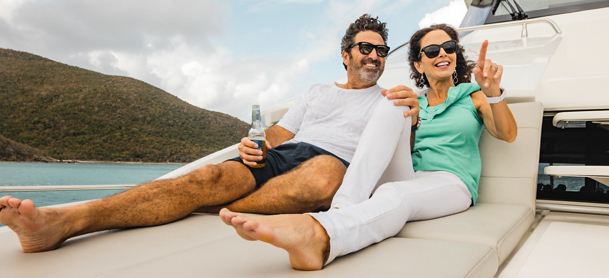 man and woman sitting on a marinemax charter