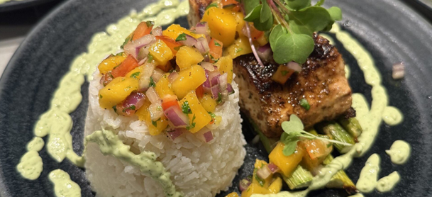 Miso Glazed Mahi over coconut rice with mango salsa, roasted asparagus and avocado crema 